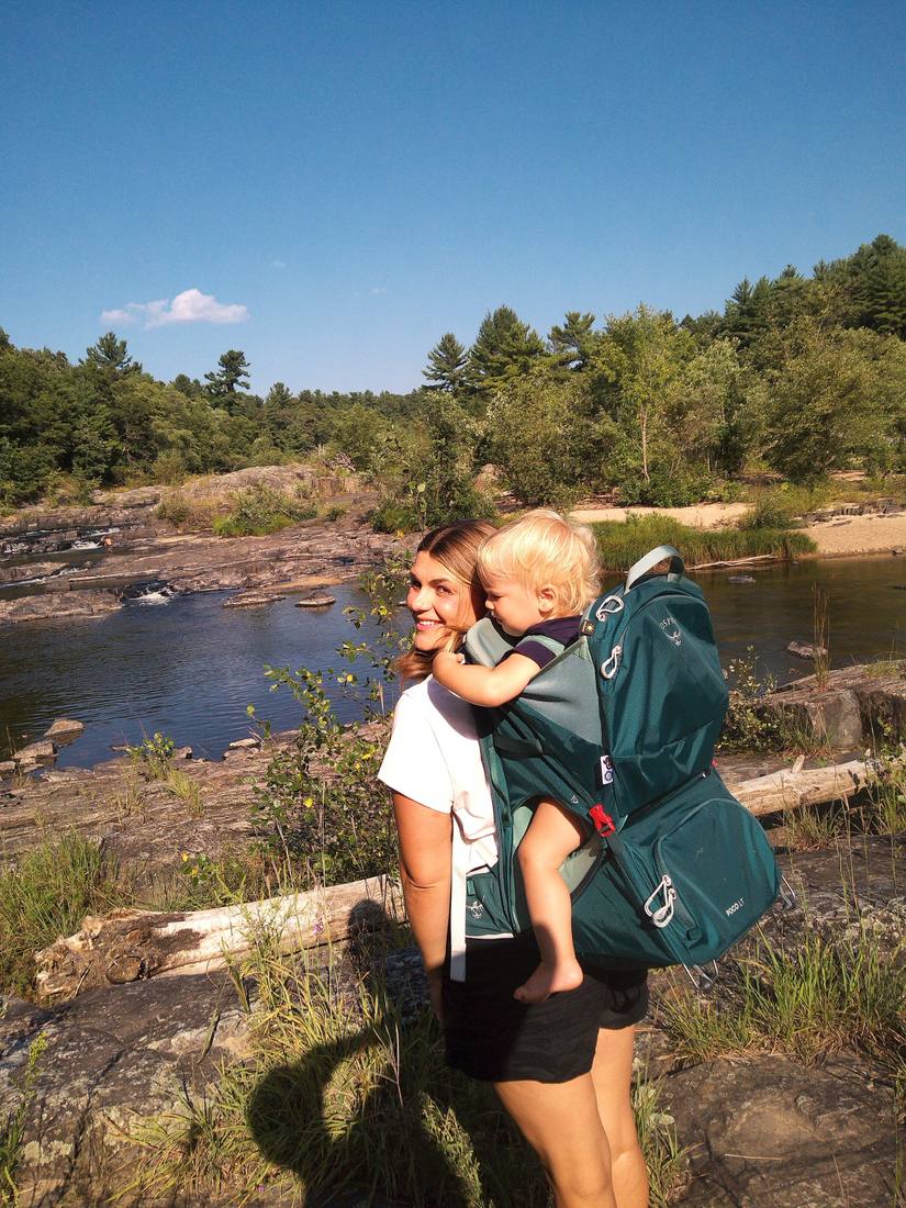 Emery and her mom out on a family hike with the Camp Snap Pro