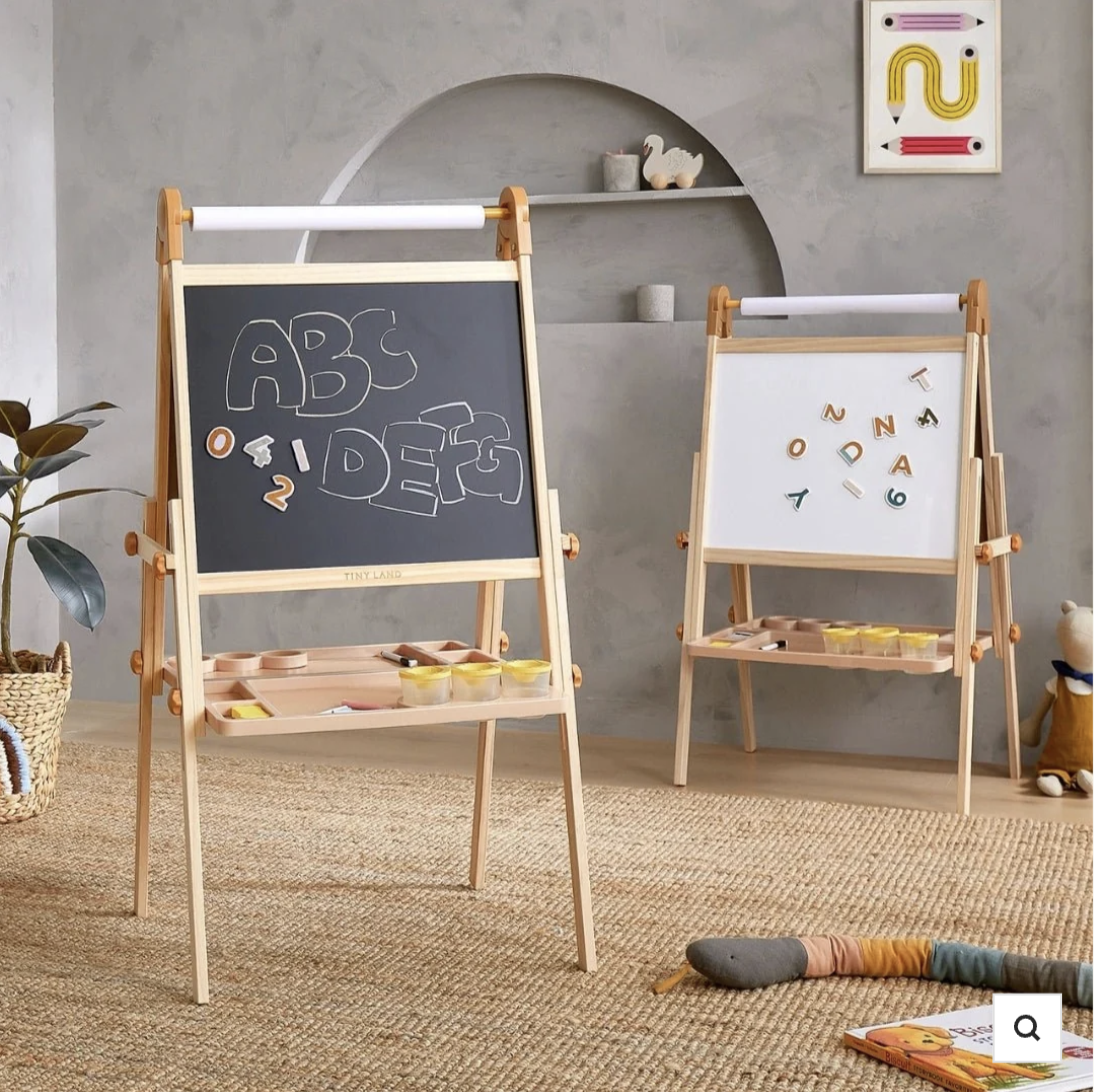Double-sided kids easel with chalkboard and magnetic whiteboard, product photo.