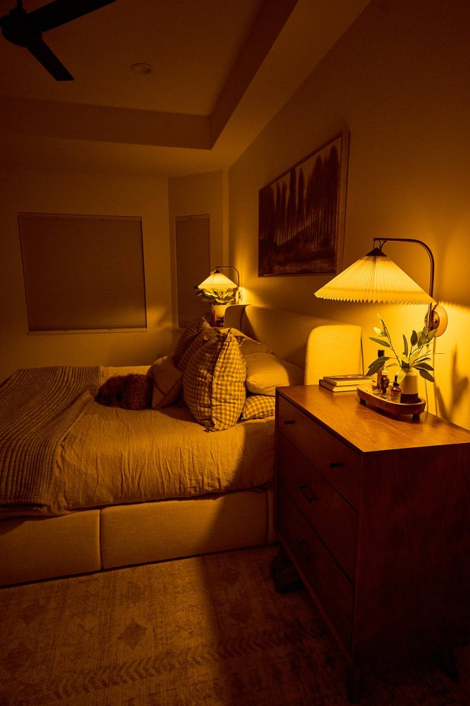 Cozy bedroom with dog curled up on the bed, capturing the slow winter evenings with little ones
